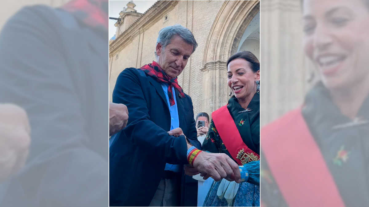 Chueca empfängt Feijóo bei der Ofrenda de Frutos mit einem Maßband der Virgen: „Für Spaniens künftigen Präsidenten“